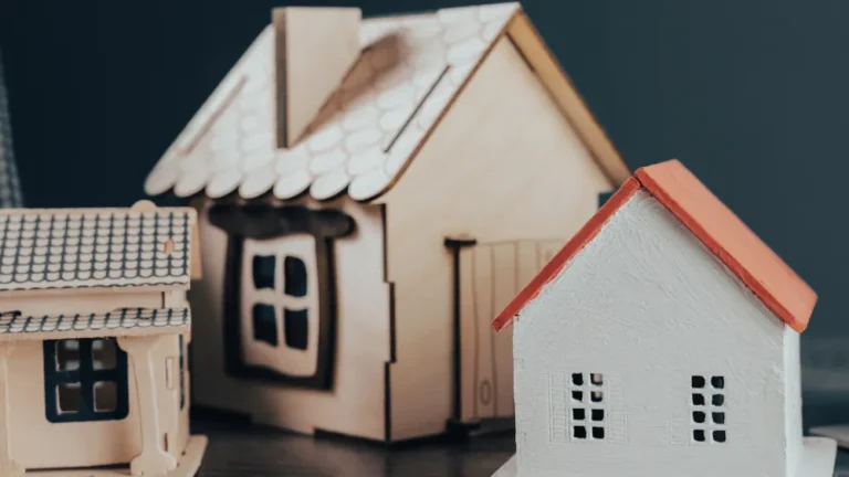 Small wooden model houses of different sizes